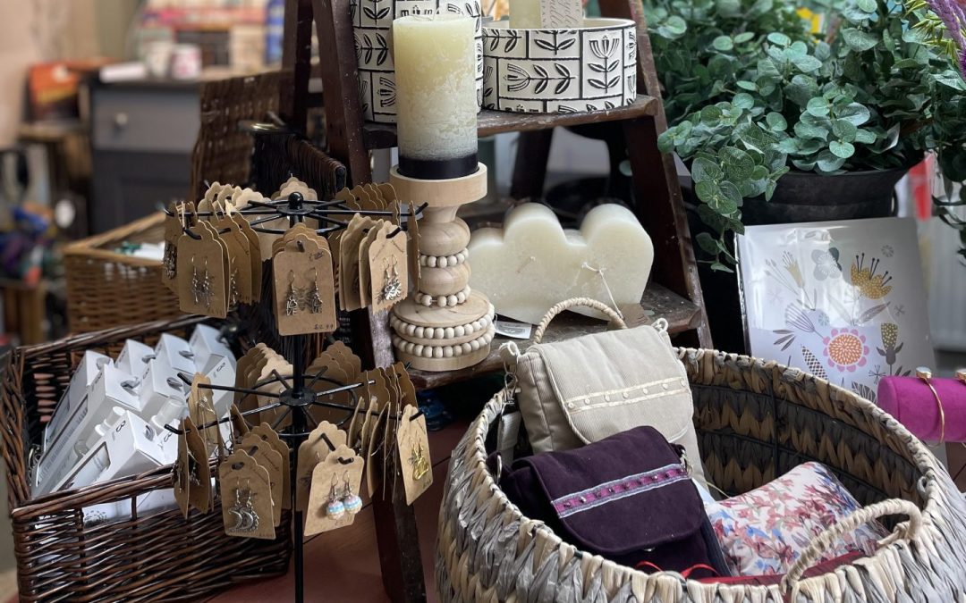 Gift hamper and décor items arranged in busy plant shop